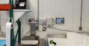 Wall-mounted VistaTrac equipment in factory